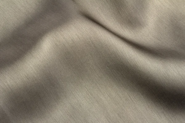 Elegante tessuto di raso grigio con sfondo pieghe — Foto Stock
