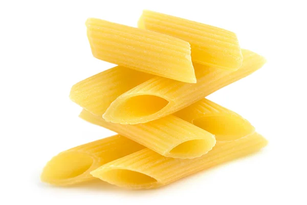 Pile of penne in balance on white background — Stock Photo, Image