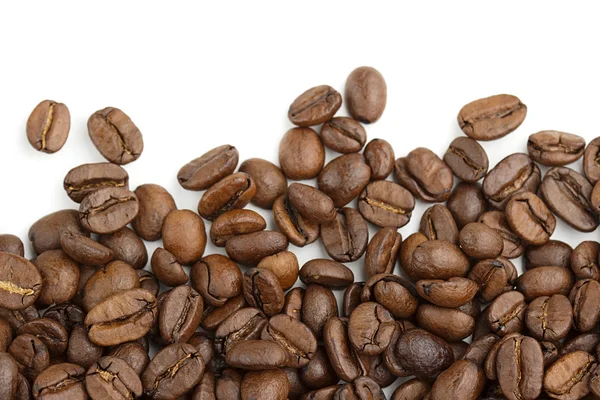 Edge of coffee beans on white background — Stock Photo, Image