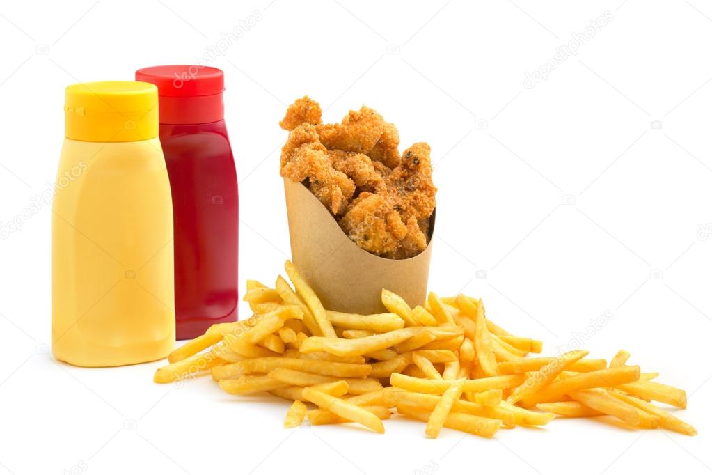 Chicken nuggets, fries and condiments