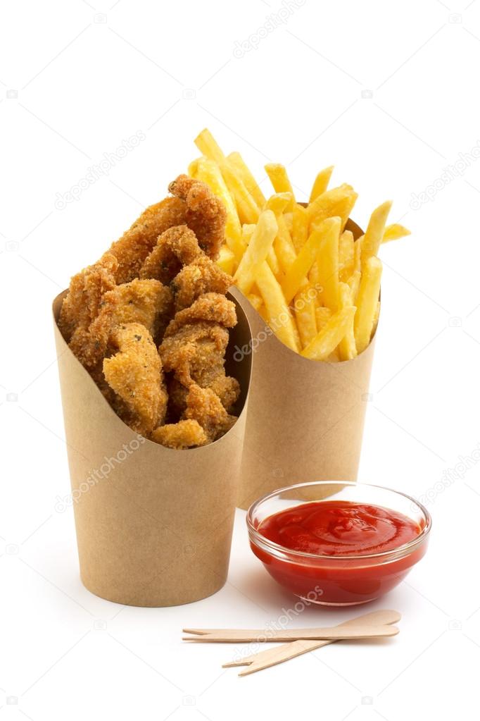 Deep fried chicken, fries and bowl of ketchup on white background