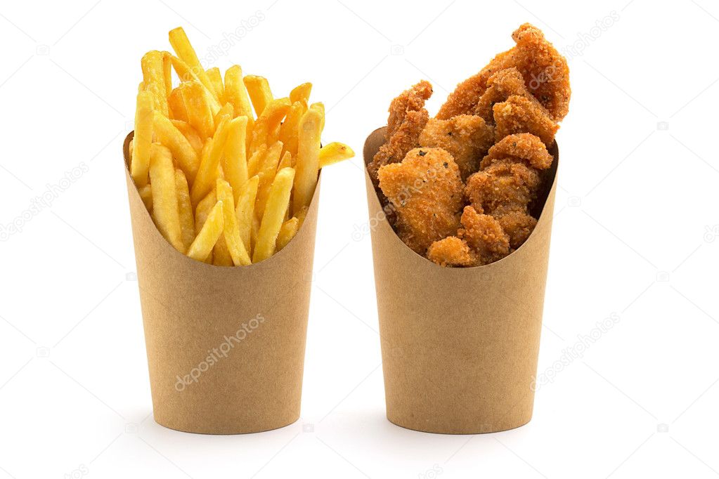 Fries and nuggets in paper boxes on white background