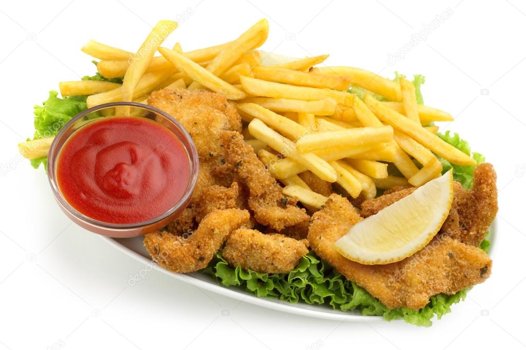 Chicken nuggets and fries with lettuce and ketchup on white background