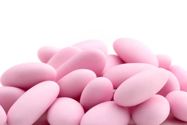 Close up of a heap of pink sugared almonds — Stock Photo, Image