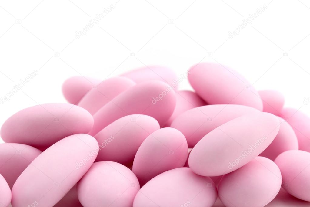 Close up of a heap of pink sugared almonds