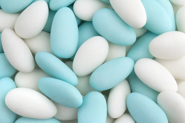 Background of white and blue sugared almonds — Stock Photo, Image