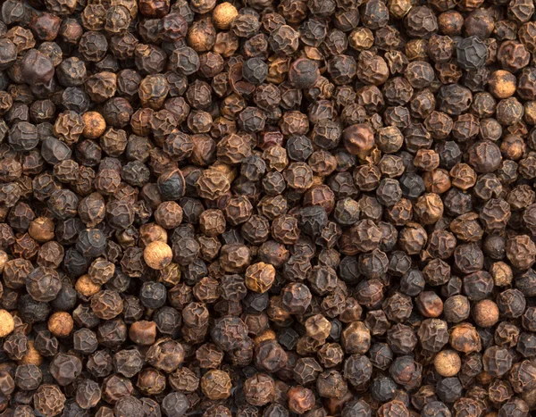 Primer plano de un fondo de pimienta negra — Foto de Stock