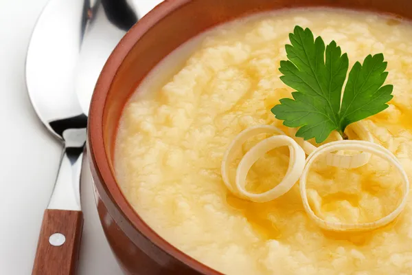 Close up of potato soup garnished with parsley and leek — Stock Image Close up of potato soup garnished with parsley and leek Stock Picture