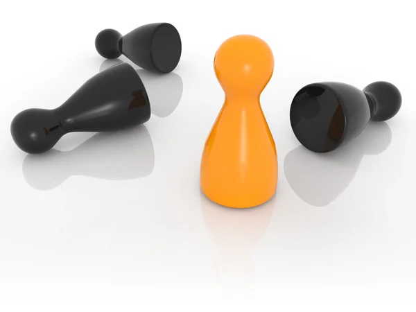 Orange pawn standing among black fallen pawns — Stock Photo, Image