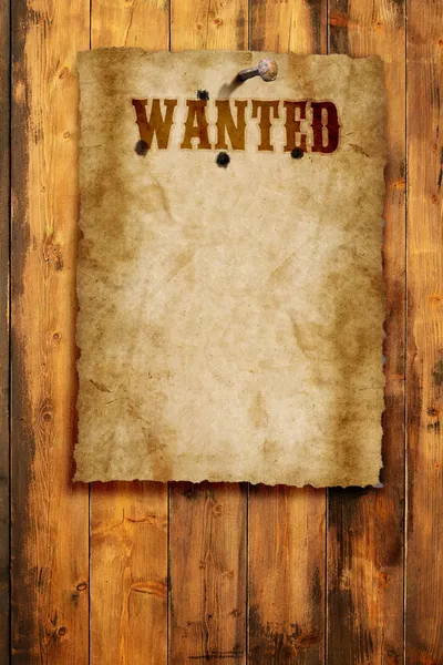 Wild west wanted poster on wooden wall