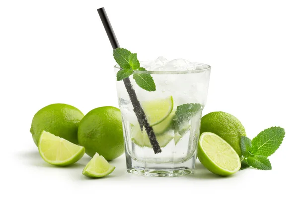 Mojito cocktail and fresh ingredients on white background — Stock Photo, Image