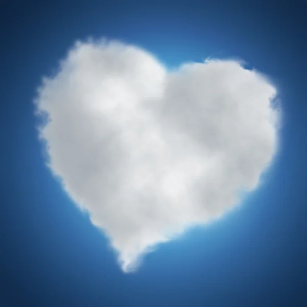 Nuvem branca em forma de coração em um fundo azul céu — Fotografia de Stock