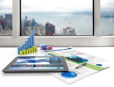 Tablet and financial graphs on a white desk clipart
