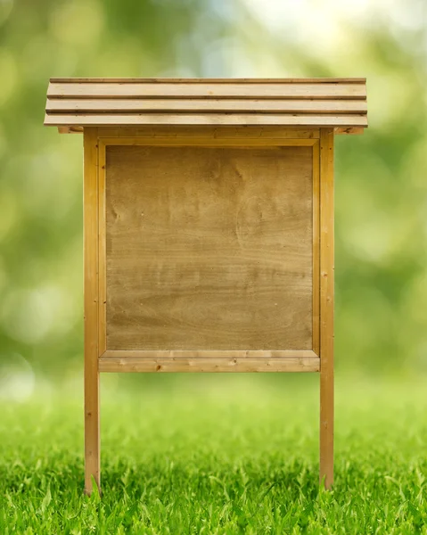 Rustic wooden notice board in public park