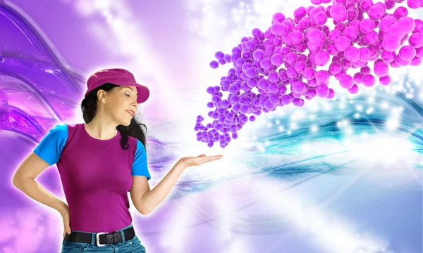 Young woman showing a colorful bubbles explosion — Stock Photo, Image