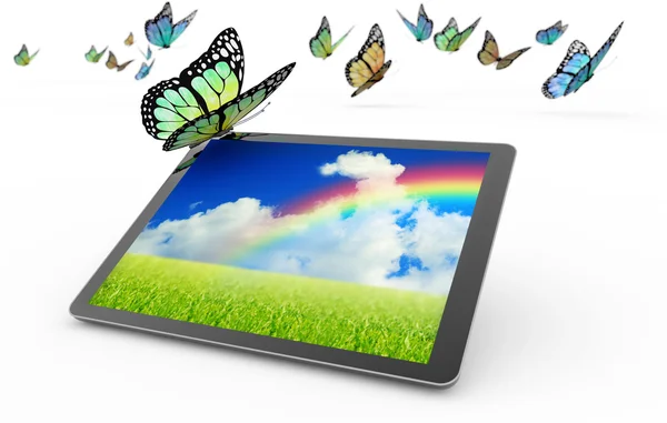 Tabletu a létající motýli na bílém pozadí — Stock fotografie