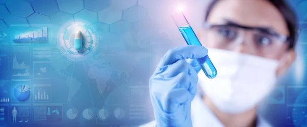 Woman Chemist Examining Test Tube Blue Liquid While Working Drugs — Zdjęcie stockowe