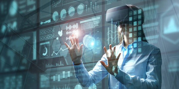 Businesswoman in vr glasses touching graphs on a virtual screen with HUD interface. Internet of things and futuristic technologies concept. Mixed media