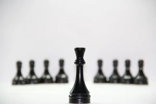 Exército de peças de xadrez preto — Fotografia de Stock