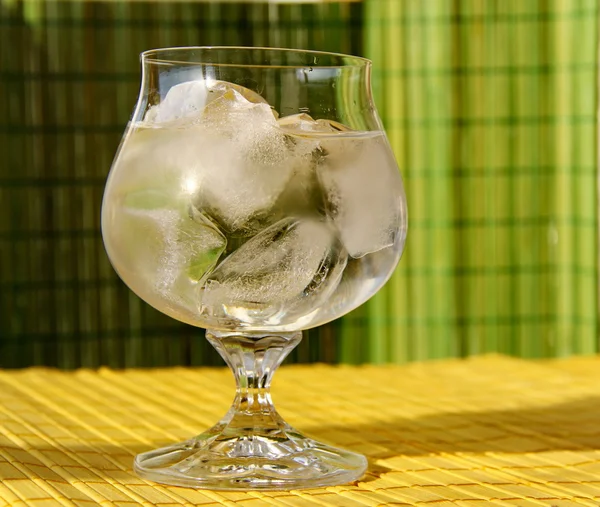Glass with water and ice — Stock Photo, Image