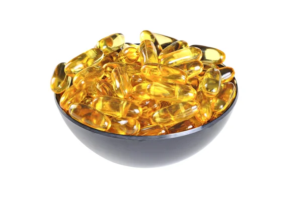Miska z omega-3 tabletki (Tran), na białym tle — Zdjęcie stockowe