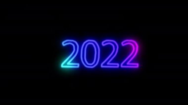 Yeni yıl 2022 kutlaması. Siyah arkaplanda neon numarası 2022