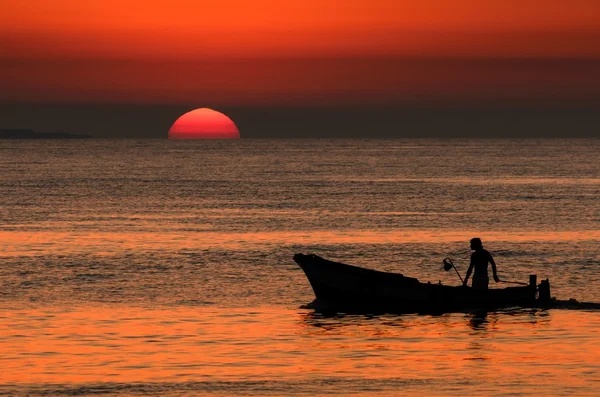 Pescador que regressa a casa da pesca Imagem De Stock