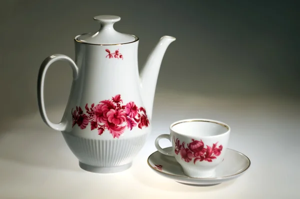 Porcelain teapot with a cup — Stock Photo, Image