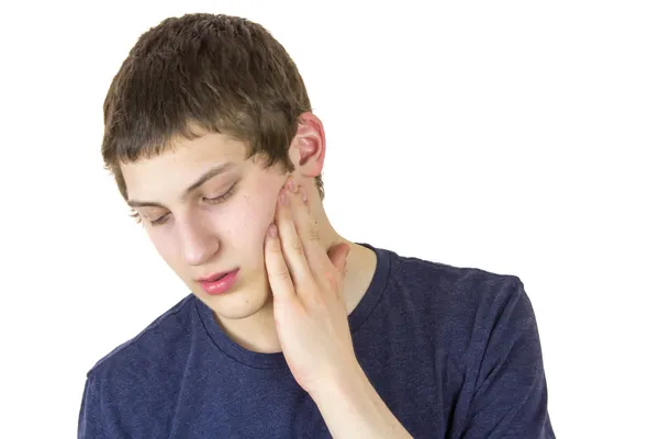 Adolescente com dor no maxilar — Fotografia de Stock
