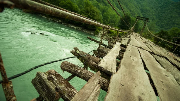 Bridge on the way to the mountains — Stock Photo, Image