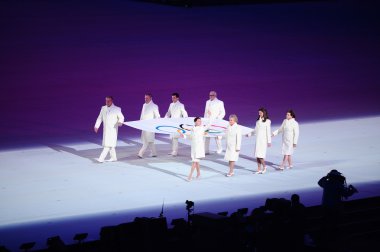 Opening ceremony of Sochi 2014, bearers of the Olympic flag clipart