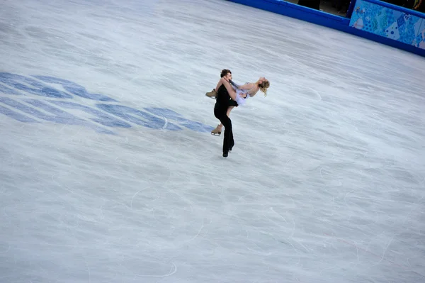 Pernelle carron і Ллойд Джонс в Сочі 2014 xxii Зимові Олімпійські ігри — стокове фото