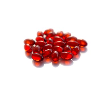 izole kırmızı e vitamini hapları