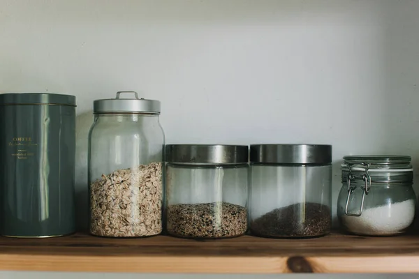 stocked and organised kitchen shelf in cupboard. cooking from pantry concept