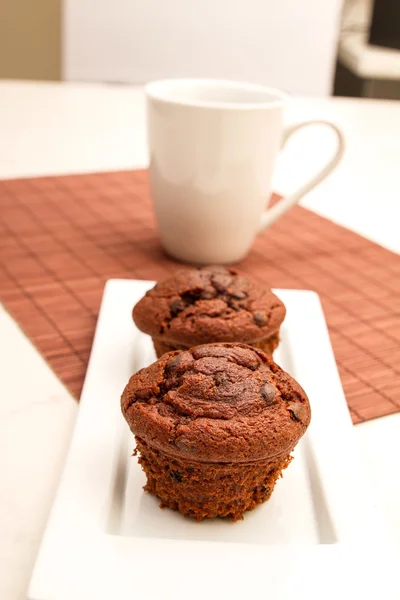 Chocolate Muffins with a cup of coffee — Stock Photo, Image