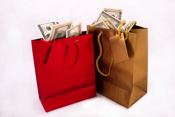 Gift bags with dollars — Stock Photo, Image