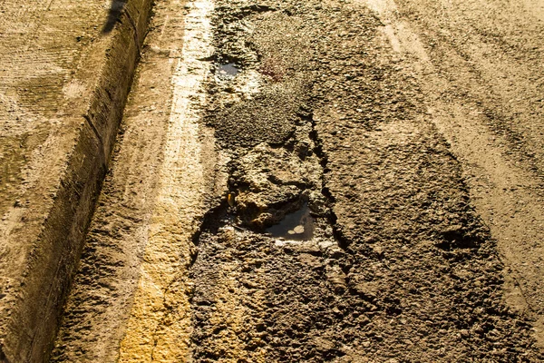 Broken road surface — Stock Photo, Image