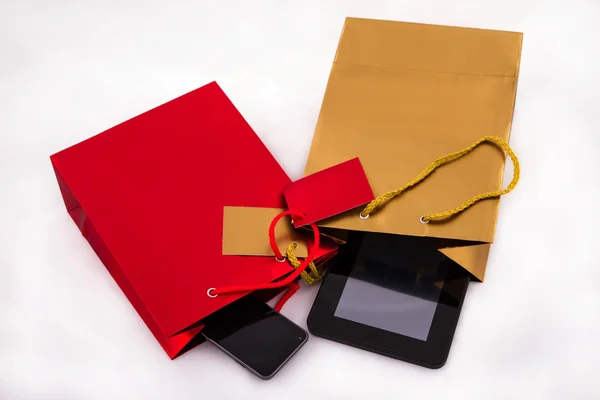 Two gift bags with electronics — Stock Photo, Image