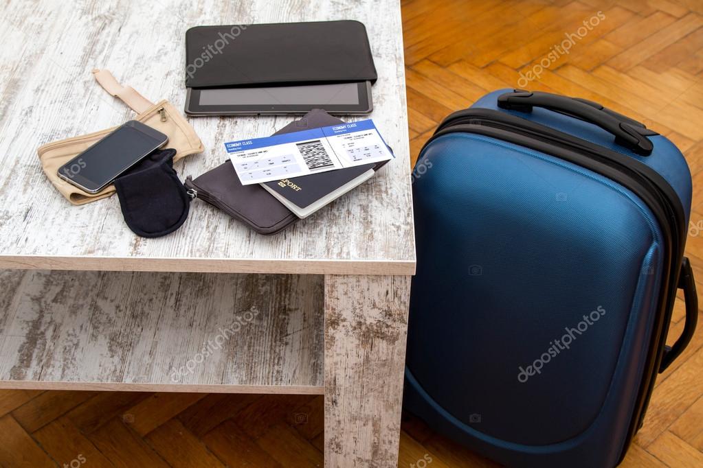 Airline ticket, passport and luggage