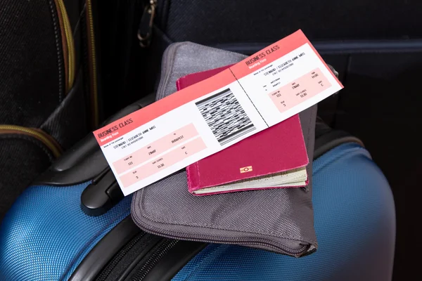 Airline ticket, passport and luggage — Stock Photo, Image