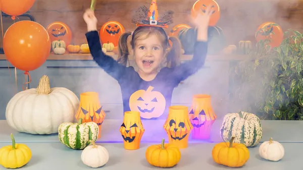 Little Halloween Witch Conjures Pumpkins Magic Wand Happy Child Smiles — Stock Photo, Image