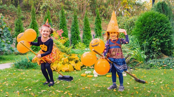 Little Witches Learn Fly Broomsticks Outdoor Halloween Party Happy Children — Stock Photo, Image