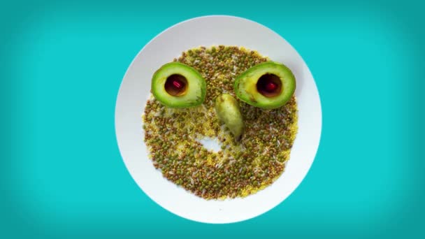 Cartoon animated of character funny grinning faces depicting emotions and smiles is assembled from real seeds, avacado, pear. Funny cartoon Abstract person. Motion design art. — Stock Video