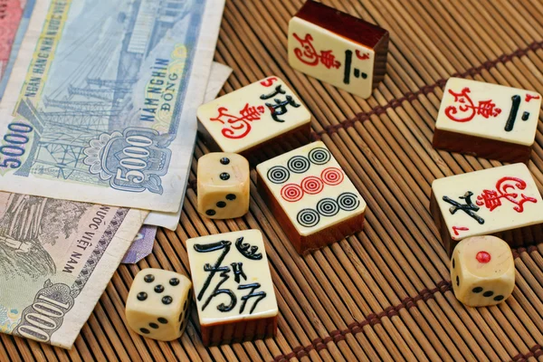 Gaming Pieces With Asian Money — Stock Photo, Image