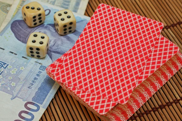 Gaming Pieces With Asian Money — Stock Photo, Image