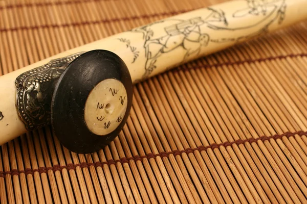 Opium Pipe On A Bamboo Mat — Stock Photo, Image