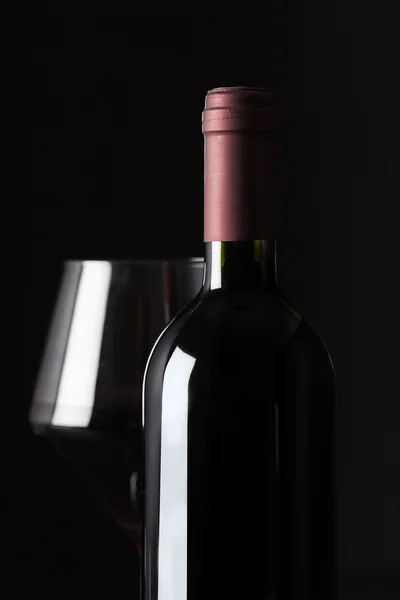 Bottle and glass with red win — Stock Photo, Image