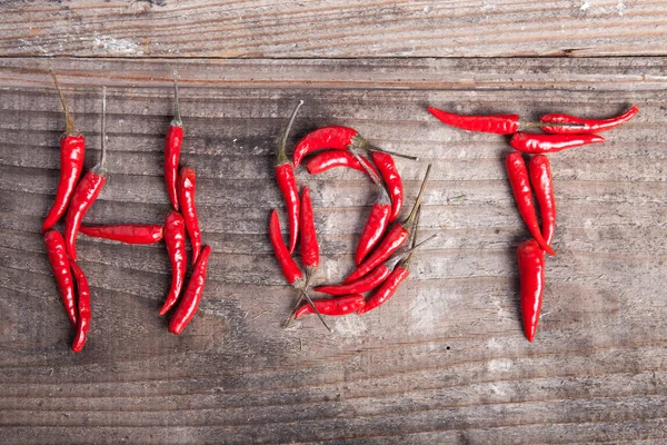 Escritura caliente con chile rojo picante —  Fotos de Stock