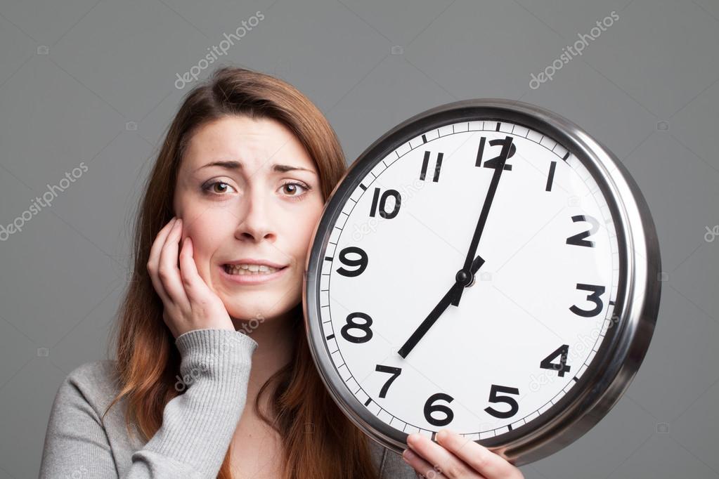 Young woman running out of time