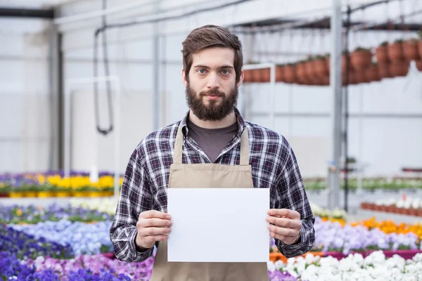 Male Garden Worker Holding an Open Signboard — Stock Photo, Image